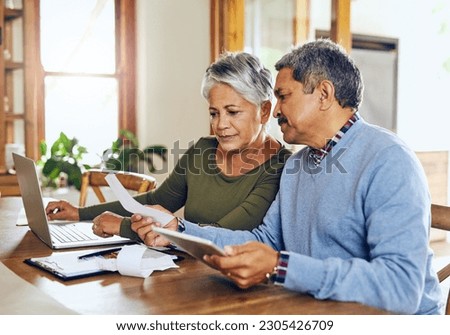 Senior couple, budget planning and health insurance checklist with computer at home. Documents, pension and elderly people with financial, tax and debt form in a house with bills and pc admin Royalty-Free Stock Photo #2305426709