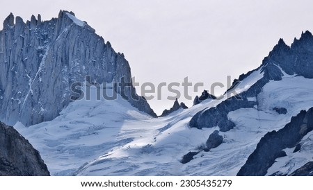 A view of a snowy peak close up snow cap in Andes mountains on the way to Fitz Roy close to El Chalten Patagonia Argentina  Royalty-Free Stock Photo #2305435279