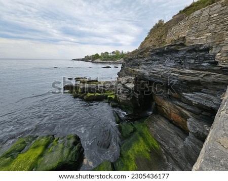 
The Cliffwalk in Newport, Rhode Island offers a breathtaking coastal trail with stunning ocean views and historic mansions. Royalty-Free Stock Photo #2305436177