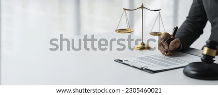 copy space, banner, panorama Lawyer or legal counsel holding the hammer of justice Concluded in terms of contract documents Concept of Lawyer or Law Enforcement holding hammer as a judgment.