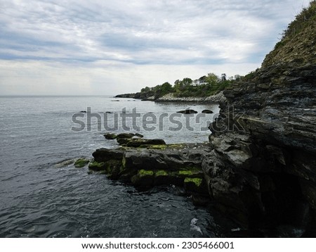 
The Cliffwalk in Newport, Rhode Island offers a breathtaking coastal trail with stunning ocean views and historic mansions. Royalty-Free Stock Photo #2305466001