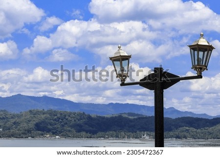outdoor vintage lamp post with beautiful landscape background. aesthetic light. images for wallpapers.
