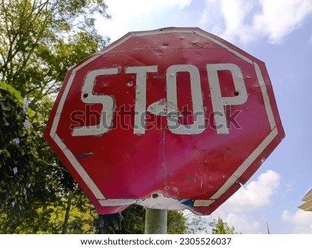 Red stop signpost, close-up. Stop Traffic Sign.