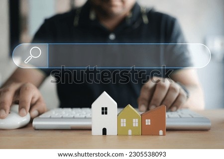 House searching, choice of location for construction, of mortgage, rental housing. construction, sales, lease, home realtor business concept. Using searching browsing internet data information. Royalty-Free Stock Photo #2305538093