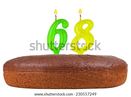 birthday cake with candles number 68 isolated on white background