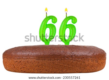 birthday cake with candles number 66 isolated on white background