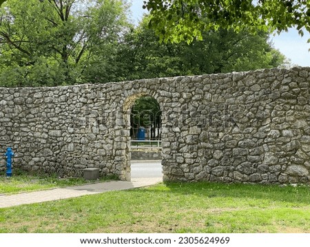 The walls and entrance gate of the Frankopan castle - Ogulin, Croatia (Zidine i ulazna vrata Frankopanskog kaštela - Ogulin, Hrvatska) Royalty-Free Stock Photo #2305624969