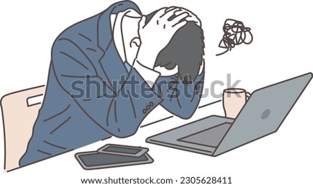 Businessman holding his head in front of a computer
 Royalty-Free Stock Photo #2305628411