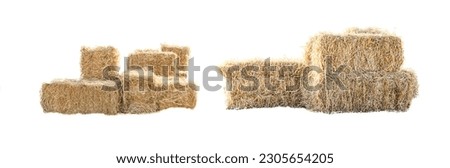 Golden yellow haystack isolated on a white background hay is a tightly joined bale of straw. Royalty-Free Stock Photo #2305654205