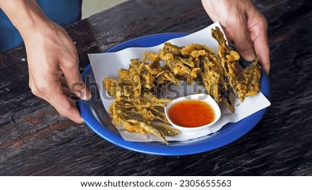 deep fried tea leaf with sweet spicy sauce ,Thai food.