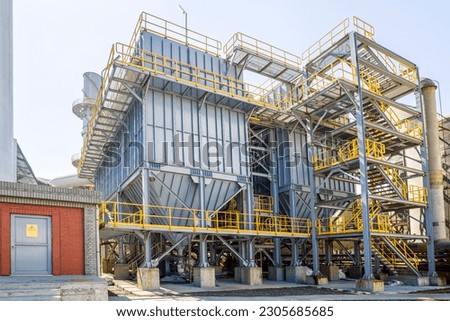 Dust collector air bag filter. It is a system used to enhance the quality of air released from industrial and commercial processes by collecting dust and other impurities from air or gas.	 Royalty-Free Stock Photo #2305685685