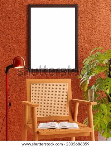 Empty photo frame mockup hanging on earthy brown colour wall background.