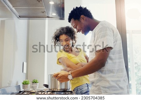 Cooking, love and food with couple in kitchen for bonding, breakfast and morning. Happiness, smile and health with man and woman preparing meal together at home for relax, nutrition and wellness Royalty-Free Stock Photo #2305704385