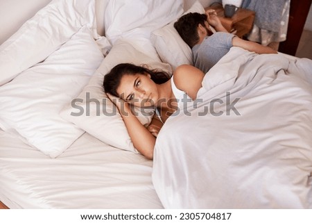 Angry woman, couple and fight in bed in the morning feeling frustrated from divorce talk. Marriage problem, conflict and fighting in a bedroom at home with anger argument and communication issue Royalty-Free Stock Photo #2305704817