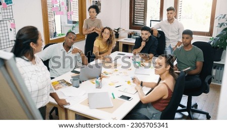 Planning, presentation and business people brainstorming in office boardroom while doing research. Collaboration, teamwork and group of corporate employees working on project in meeting in workplace. Royalty-Free Stock Photo #2305705341