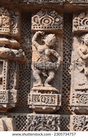 Statue with Nagara style of architecture in walls of world famous Sun Temple, Konark, Odisha, India