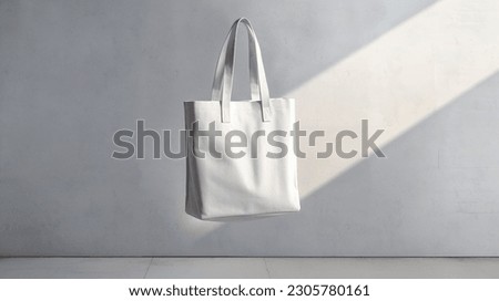 floating blank white canvas tote bag sunny day front facing  Royalty-Free Stock Photo #2305780161