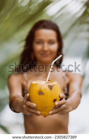 King Coconut with Straw in Bikini Beach Woman Hands Outdoors