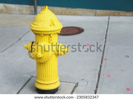 fire hydrant represents protection and the vital role of firefighters in safeguarding our communities, A symbol of safety and emergency preparedness Royalty-Free Stock Photo #2305832347
