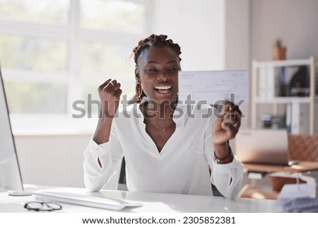 Holding Paycheck Or Payroll Check Or Insurance Cheque In Hand Royalty-Free Stock Photo #2305852381