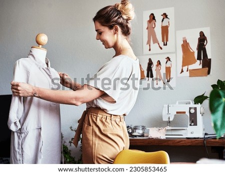 Fashion, happy woman and designer with mannequin, creative small business and smile. Happiness, creativity and tailor in boutique with dress design on doll at textile manufacturing start up studio. Royalty-Free Stock Photo #2305853465