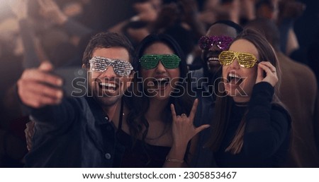 Selfie, sunglasses and friends at party for celebration, festival and dance at social event. Night club, disco and happy men and women take picture for memories, post and celebrate new years eve