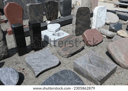 Offer of tombstones at a stonemason Royalty-Free Stock Photo #2305862879