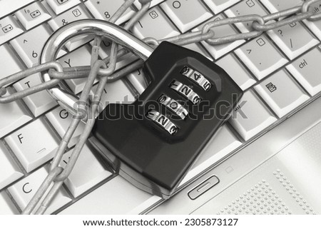 Data protection in 2024. Padlock with numbers 2024 and chain on computer keyboard.