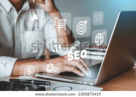 Businessman using a Smathphone for analysis SEO Search Engine Optimization Marketing Ranking Traffic Internet connection online for find information  Business Technology Concept.
