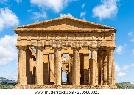 Ancient temple in the archaeological site of the Valley of the Temples in Agrigento. The temple is called the Temple of Concord, Sicily, Italy. Royalty-Free Stock Photo #2305888325