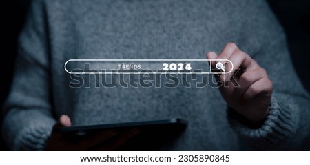 Business start up new goals and trends touching virtual number future growth in 2024, plan and vision for next year, progress and success in 2024, business challenge technology and soft power concept. Royalty-Free Stock Photo #2305890845