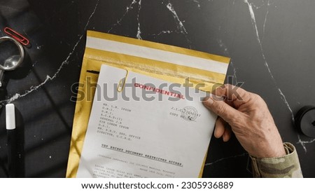 Military receives secret and private documents Royalty-Free Stock Photo #2305936889