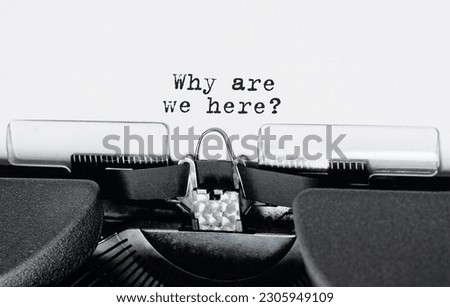Text why are we here typed on retro typewriter