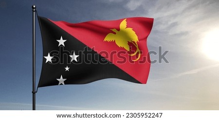 Papua New Guinea national flag cloth fabric waving on beautiful grey sky Background.
