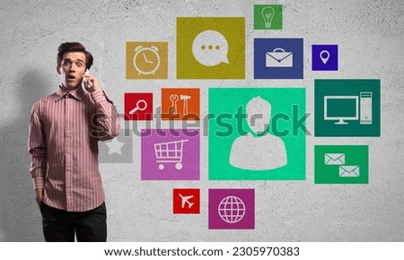 Man talking mobile phone and color application icons at background