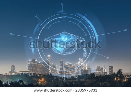 Illuminated Skyline panorama of Los Angeles downtown at night time, California, USA. Skyscrapers of LA city. Technologies and education concept. Academic research, top ranking universities, hologram
