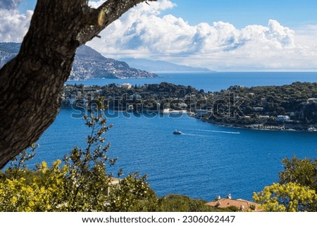 Small boat sailing in the Villefranche-sur-Mer Roadstead from Mont Alban in Nice Royalty-Free Stock Photo #2306062447