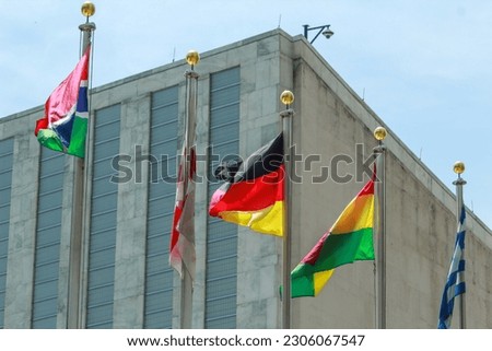 Flags of Germany and Ghana waving in front of the United Nations Headquarters in New York Royalty-Free Stock Photo #2306067547