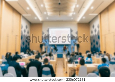 Blur picture backgroud of meeting siminar, Banner of Abstract blurred photo of conference hall or seminar room with attendee background.