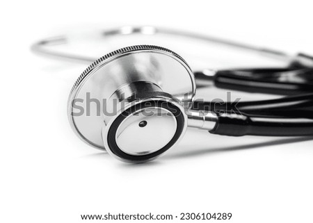Black stethoscope for doctor diagnostic coronavirus disease, medical tool for health on white background with copy space.
