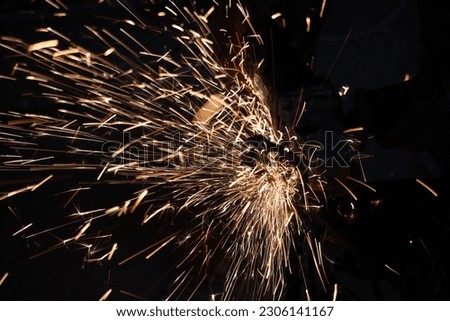  Sparks from angle grinder. Metalwork concept.
