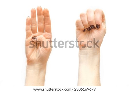 Signal, stop gesture that can help woman,children, people experiencing domestic violence.Hand sign showing that one is victim of domestic Violence.social protection,defense concept. Royalty-Free Stock Photo #2306169679
