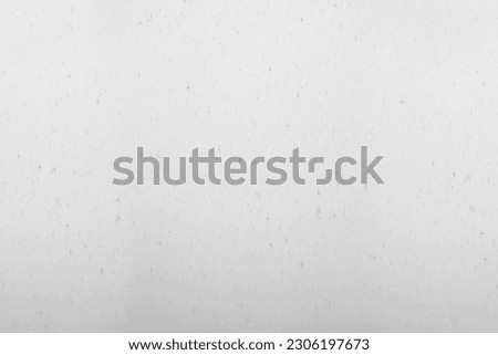 Dirt grey dust isolated on white background and texture, top view. Falling gray snow with white winter sky on background. 