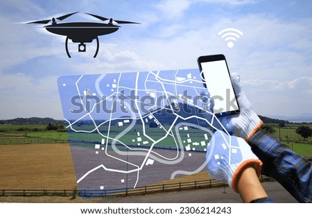 Farmers use drones to survey farmland to map and plan their crops. smart farm concept.