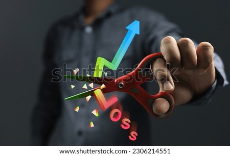 Stock market investor choose to use the stop loss method to saving costs or willing to sell losses before the price goes down much further. Scissors cutting graph 3D to broken for cut loss concept. Royalty-Free Stock Photo #2306214551