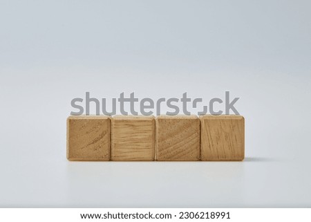 Wooden toy cube blocks with empty copy space for message word on white background