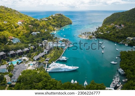 Sunny day in Marigot Bay, St. Lucia. perfect for vacation and boat tours Royalty-Free Stock Photo #2306226777