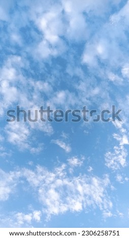 blue sky with random stretches of clouds