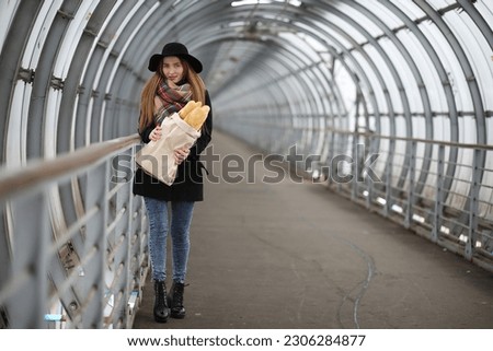 French woman on walk in the central part of the city