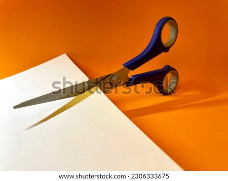 Scissors and paper. Cut paper. Scissors cut paper.